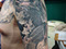 black grey cover-up oriental koi maple leaves tattooed men